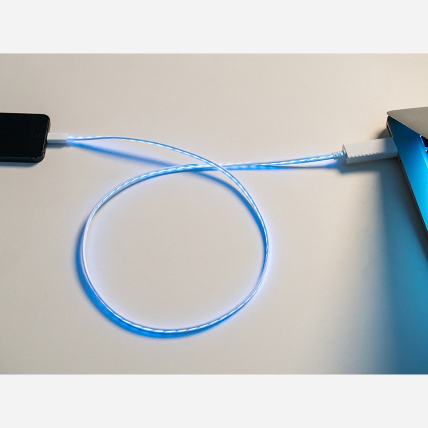 Elegant Flowing Effect Lightning Cable for iOS Devices in White with Aqua Electroluminescent Feature
