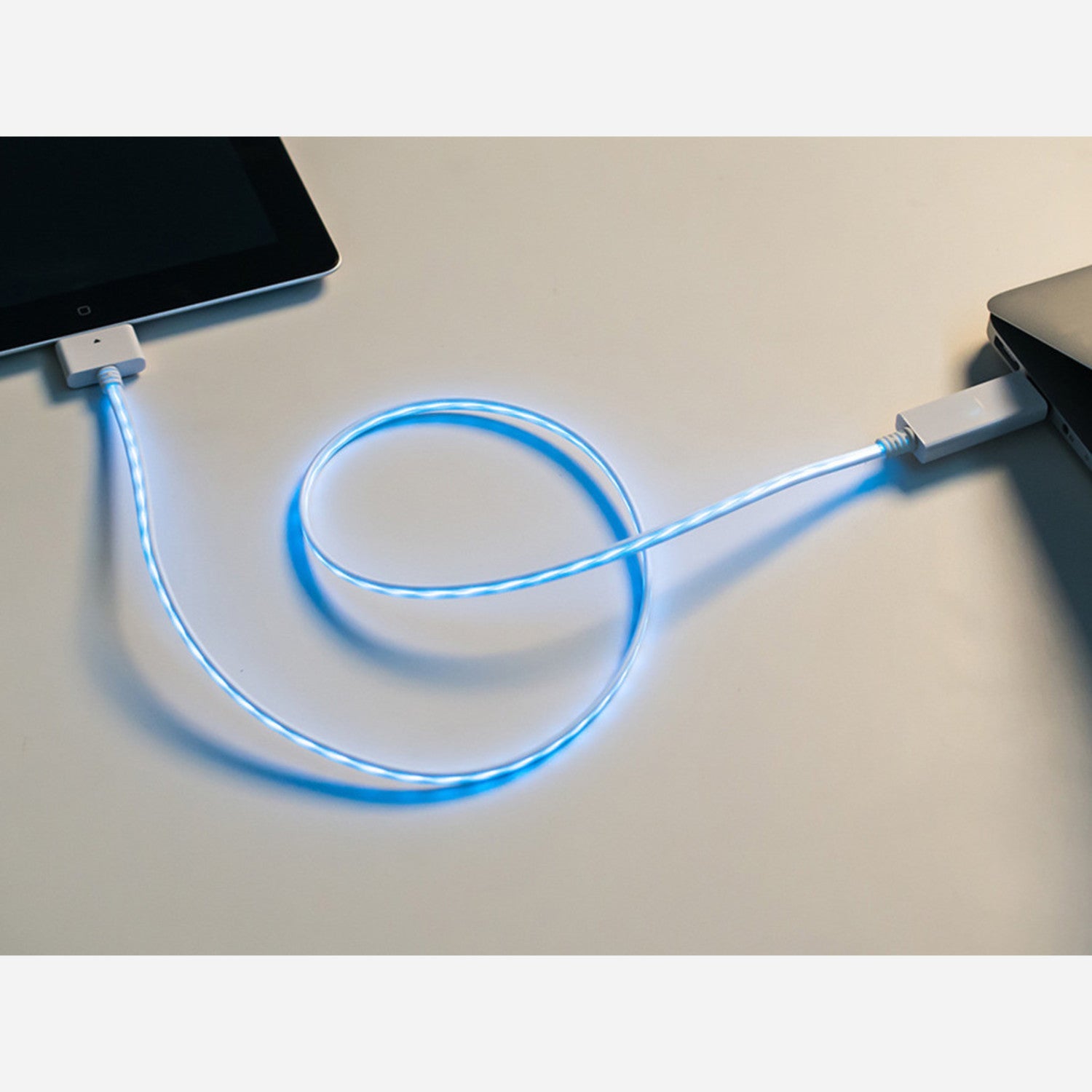 Stylish Flowing Effect iOS Dock Data and Charging Cable in White with Aqua Electroluminescent Feature