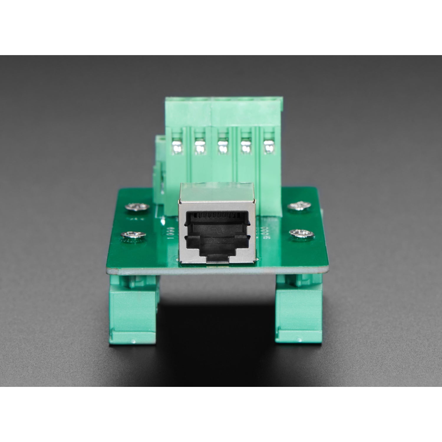 DIN Rail Mountable Right Angle RJ-45 to Terminal Block Adapter for Simplified Wiring
