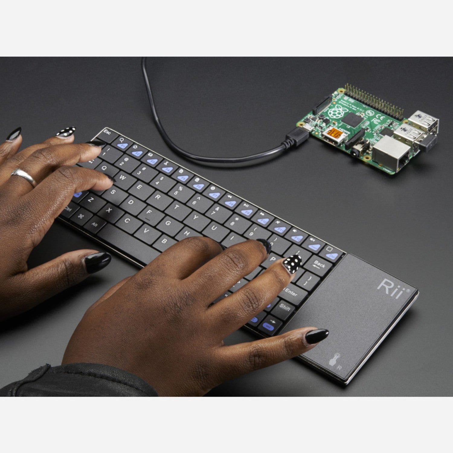 Ultra-slim Full-sized Wireless Keyboard with Built-in Trackpad